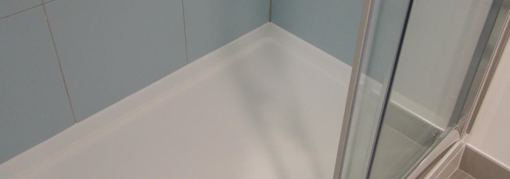 shower tray with white silicone