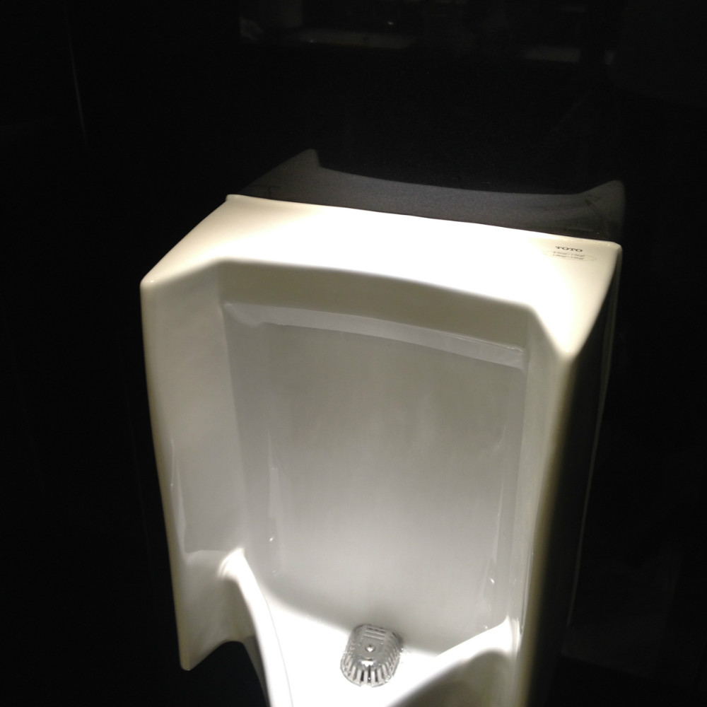urinal with white silicone